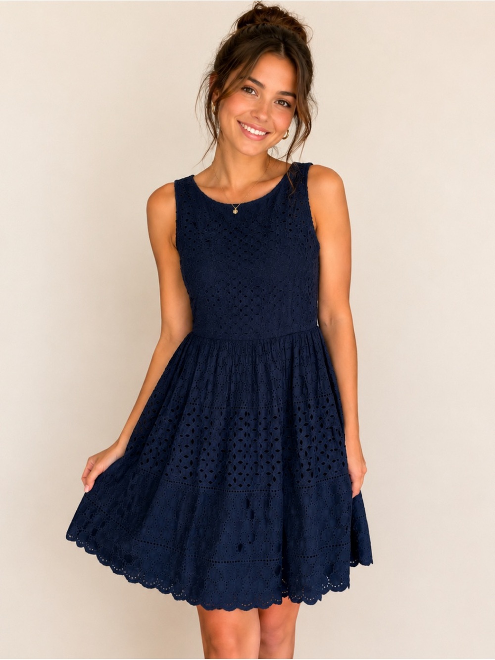 Old Navy navy blue dress with eyelet detail and inner liner.